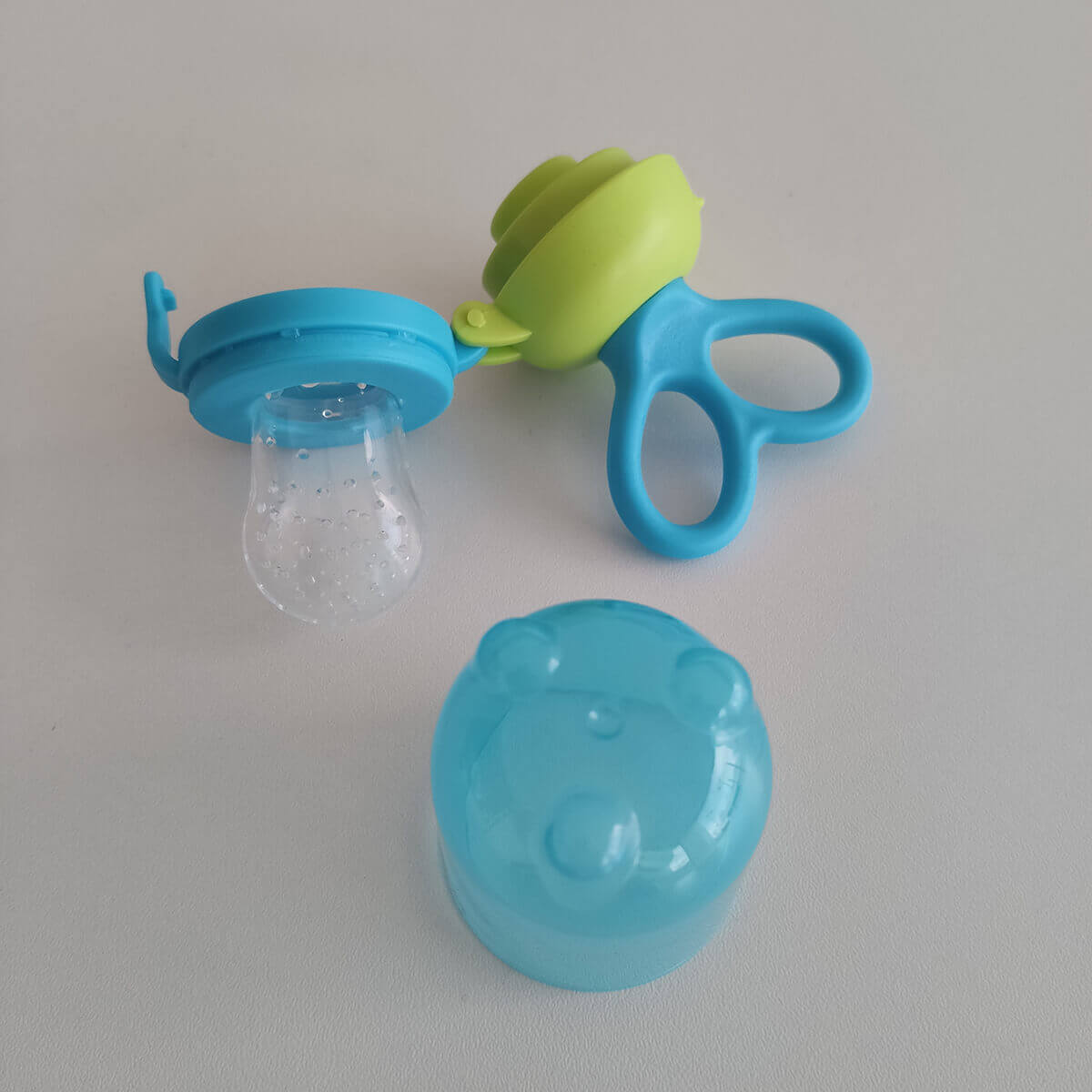 Chupeta Alimentação para Bebes Porta Frutinha Comer Fruta Buba Rosa
