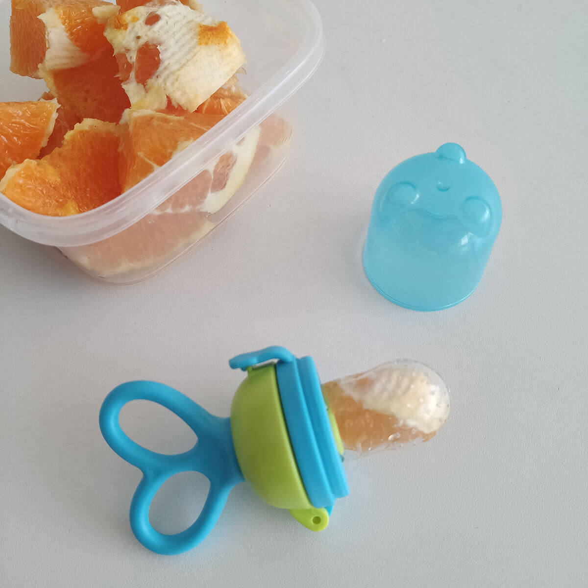 Chupeta Alimentação para Bebes Porta Frutinha Comer Fruta Buba Rosa