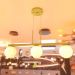 Lustre Pendente Jabuti Triplo Dourado com Globos de Vidro Brancos para 3 Lâmpadas G9 de LED Bivolt